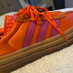 Adidas Gazelle Bright Orange and Fuschia sneakers